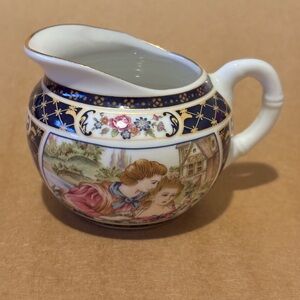 Courting Couple Creamer